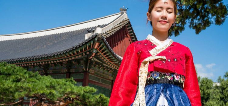 Korean woman elegantly wearing a hanbok.